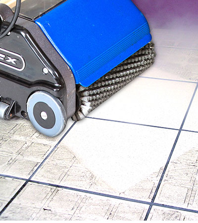 Cordless battery powered cleaner for cleaning bathroom tiles and floors